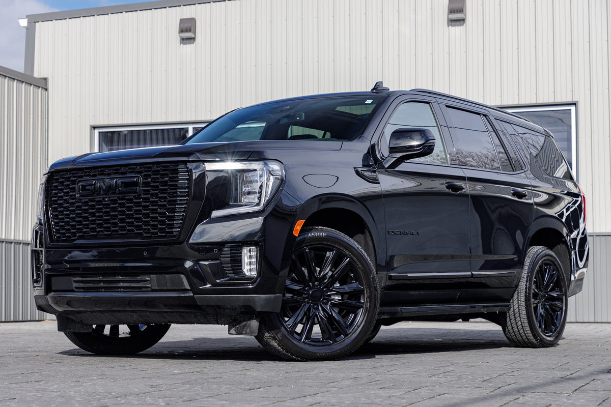 2023 GMC Yukon Denali with GMC Factory Suspension, 22x9 GMC Stock wheels, and Bridgestone Alenza tires.