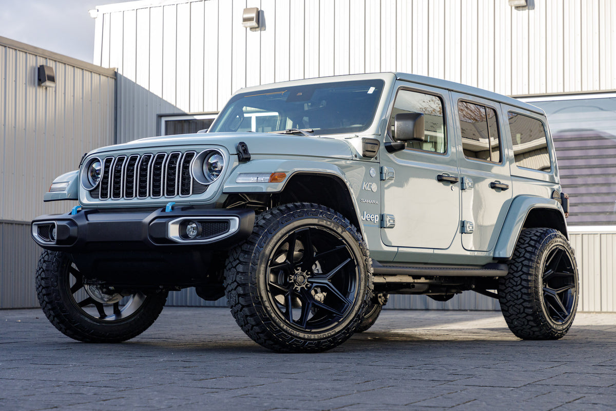 2024 Jeep Wrangler Unlimited Sahara 4XE with a 2.5" Rough Country lift kit, 22x12 Fuel Flux wheels, and 35" Fury Country Hunter R/T tires.