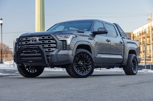 2025 Toyota Tundra 1794 Edition with Toyota Stock suspension, 20x10 Fuel Strike wheels, and 33" Venom Power Terra Hunter R/T tires.