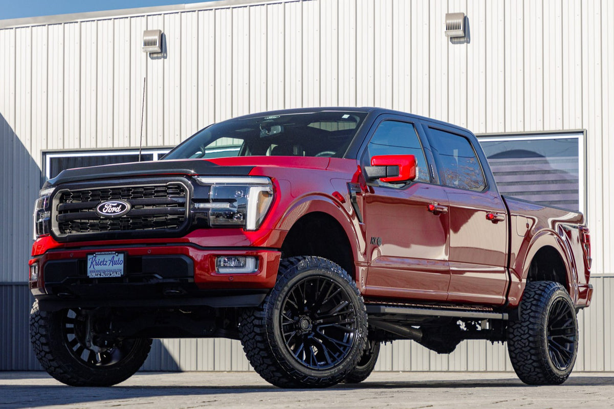 2024 Ford F-150 Lariat with a 6" Rough Country lift kit, 22x12 Fuel Rebar wheels, and 35" Fury Country Hunter R/T tires.
