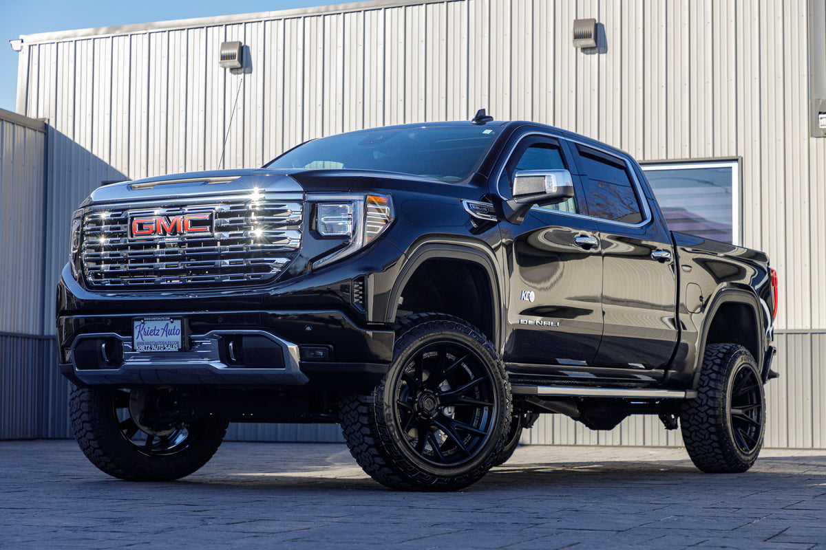 2024 GMC Sierra 1500 Denali with a 6" Rough Country lift kit, 22x12 Fuel Catalyst wheels, and 35" Fury Country Hunter R/T tires.