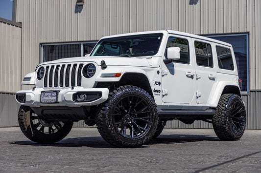 2022 Jeep Wrangler Unlimited Sahara Altitude with a 2.5" Rough Country lift kit, 22x12 Fuel Rebar wheels, and 35" Fury Country Hunter R/T tires.