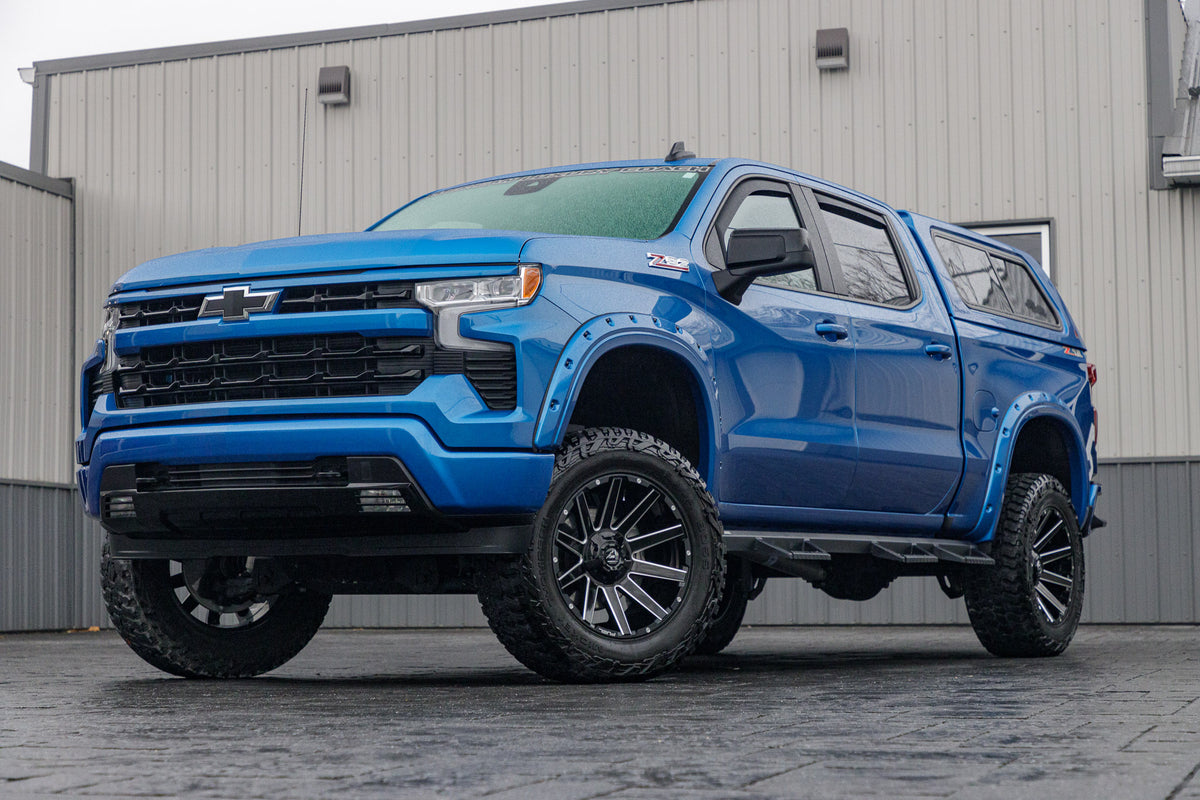 2024 Chevrolet Silverado 1500 RST with a 6" Rough Country lift kit, 20x10 Fuel Contra wheels, and 35" Mickey Thompson Baja Boss A/T tires.