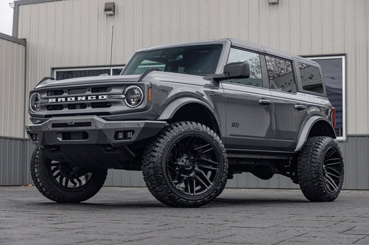 2023 Ford Bronco Big Bend with a 3.5" Rough Country lift kit, 22x12 Fuel Typhoon wheels, and 35" Fury Country Hunter R/T tires.