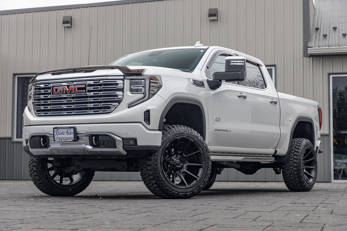 2023 GMC Sierra 1500 Denali with a 6" Rough Country lift kit, 22x12 Fuel Rebar wheels, and 35" Fury Country Hunter R/T tires.