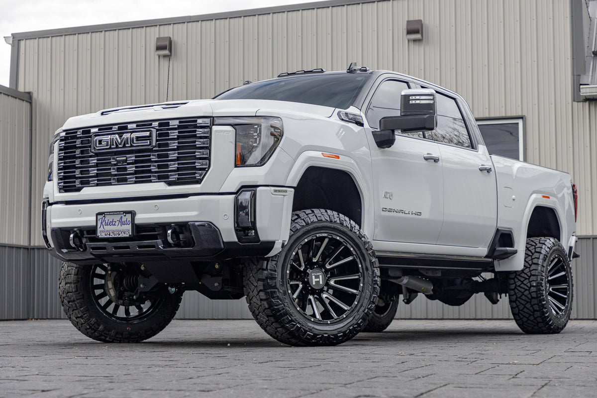 2024 GMC Sierra 2500 Denali Ultimate with a 5" BDS lift kit, 22x12 Hostile H123 wheels, and 37" Nitto Ridge Grappler tires.
