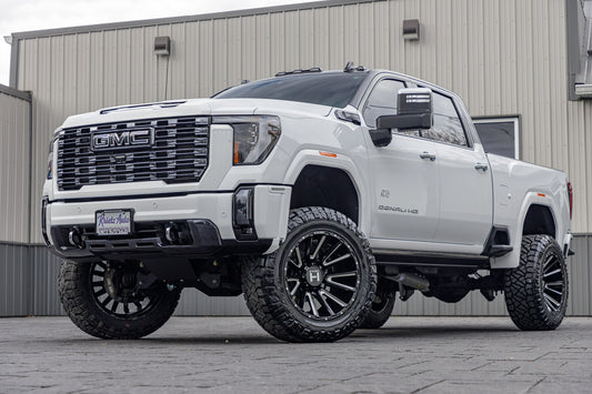 2024 GMC Sierra 2500 Denali Ultimate with a 5" BDS lift kit, 22x12 Hostile H123 wheels, and 37" Nitto Ridge Grappler tires.