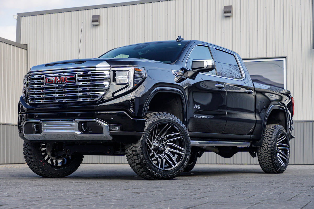 2024 GMC Sierra 1500 Denali with a 6" Rough Country lift kit, 22x12 Fuel Typhoon wheels, and 35" Fury Country Hunter R/T tires.