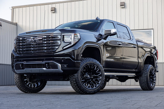 2024 GMC Sierra 1500 Denali Ultimate with a 6" Rough Country suspension lift, 22x12 Fuel Strike wheels, and 35" Fury Country Hunter R/T tires.