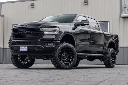 2022 Ram 1500 Laramie with a 6" Rough Country lift kit, 22x12 Fuel Twitch wheels, and 35" Fury Country Hunter R/T tires.