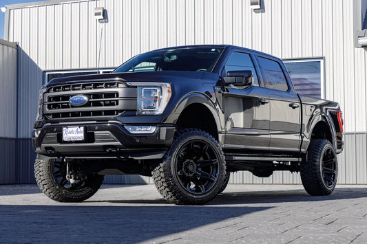 2022 Ford F-150 Lariat with a 6" Rough Country lift kit, 22x12 Fuel Brawl wheels, and 35" Fury Country Hunter R/T tires.