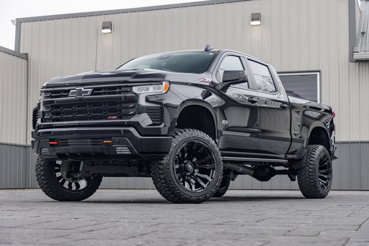 2024 Chevrolet Silverado 1500 LT Trail Boss with a 6" Rough Country lift kit, 22x12 Fuel Blitz wheels, and 35" Fury Country Hunter R/T tires.