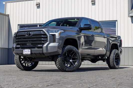 2025 Toyota Tundra Limited with a 6" Rough Country lift kit, 22x12 Fuel Flux wheels, and 35" Fury Country Hunter R/T tires.