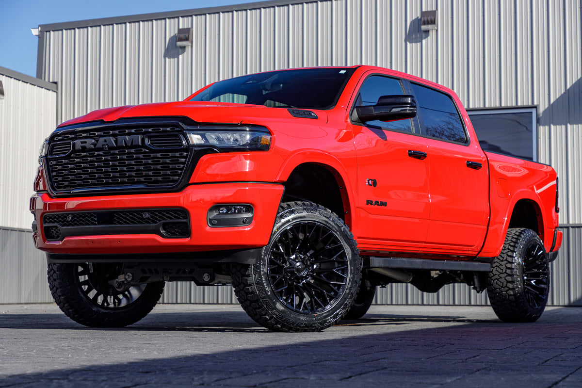 2025 Ram 1500 Lone Star with a 6" Rough Country lift kit, 22x12 Fuel Strike wheels, and 35" Fury Country Hunter R/T tires.