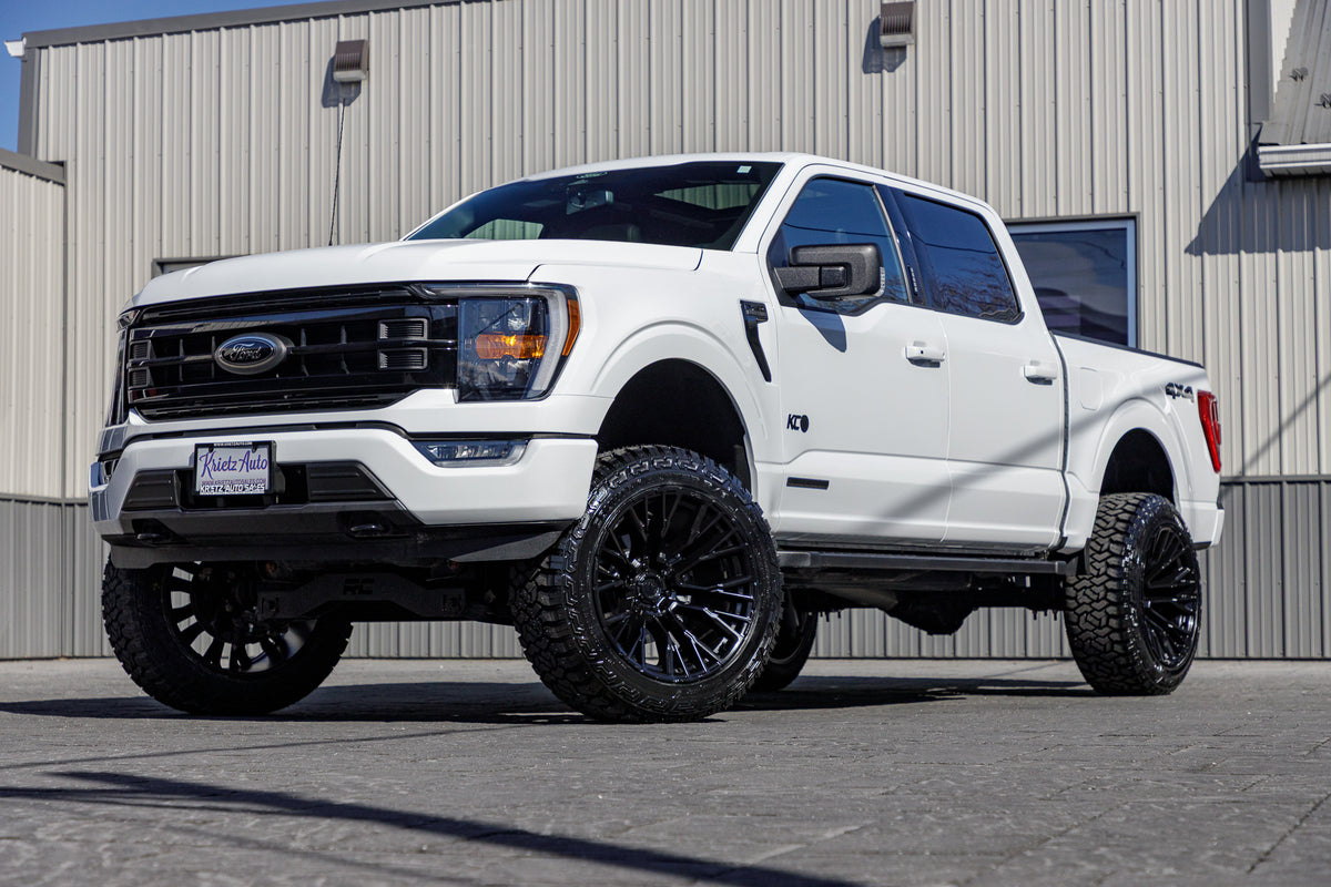 2022 Ford F-150 XLT with a 6" Rough Country lift kit, 22x12 Fuel Rebar wheels, and 35" Fury Country Hunter R/T tires.