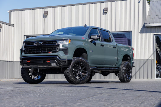 2025 Chevrolet Silverado 1500 LT Trail Boss with a 6" Rough Country lift kit, 22x12 Fuel Flux wheels, and 35" Fury Country Hunter R/T tires.