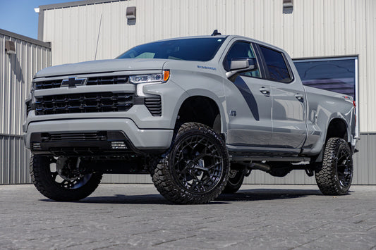 2024 Chevrolet Silverado 1500 with a 6" Rough Country lift kit, 22x12 Fuel Charger wheels, and 35" Fury Country Hunter R/T tires.