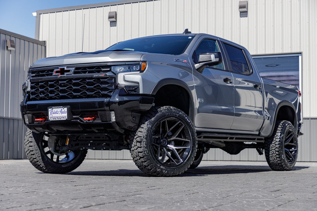 2023 Chevrolet Silverado 1500 ZR2 with a 4" ReadyLift lift kit, 22x12 Fuel Flux wheels, and 35" Fury Country Hunter R/T tires.