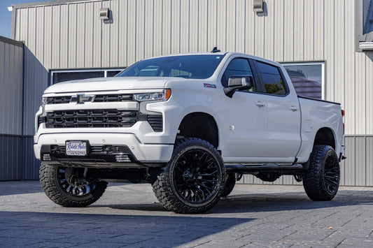 2024 Chevrolet Silverado 1500 RST with a 6" Rough Country lift kit, 22x12 Fuel Strike wheels, and 35" Fury Country Hunter R/T tires.