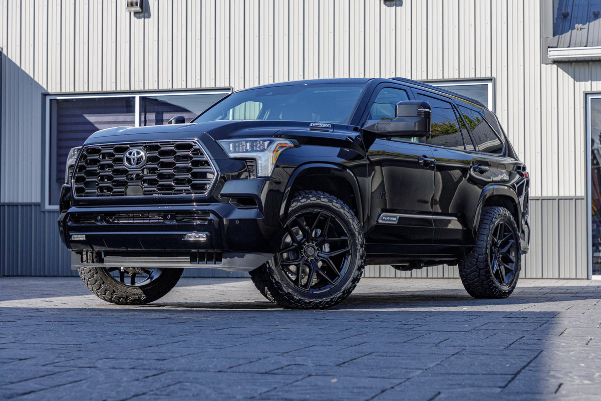 2025 Toyota Sequoia SR5 with a 1.75" Rough Country leveling kit, 22x9.5 Fuel Flux wheels, and 285/55 Toyo Open Country R/T Trail tires.