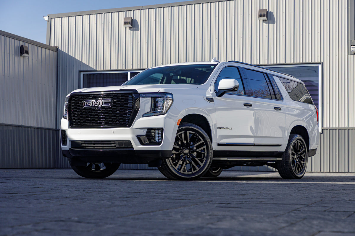 2024 GMC Yukon XL Denali with GMC Factory suspension, 22x9 GMC Stock wheels, and Bridgestone Alenza tires.