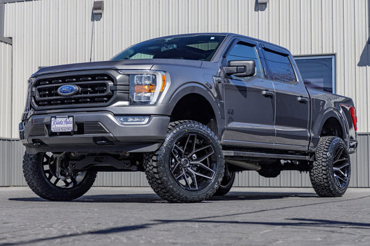 2022 Ford F-150 XLT with a 6" Rough Country lift kit, 22x12 Fuel Flux wheels, and 35" Fury Country Hunter R/T tires.