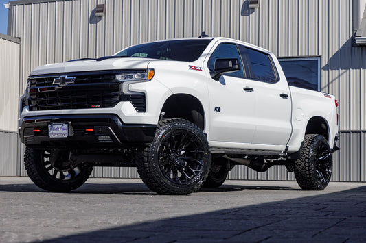 2024 Chevrolet Silverado 1500 LT Trail Boss with a 6" Rough Country lift kit, 22x12 Fuel Flame wheels, and 35" Fury Country Hunter R/T tires.