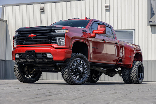 2022 Chevrolet Silverado 3500 High Country with an 8" ReadyLift lift kit, 24x8.25 American Force Pulse wheels, and 37" Fury Country Hunter M/T 2 tires.