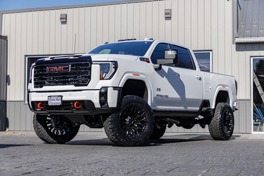 2025 GMC Sierra 3500 AT4 with a 5" BDS lift kit, 22x12 Fuel Strike wheels, and 37" Nitto Ridge Grappler tires.