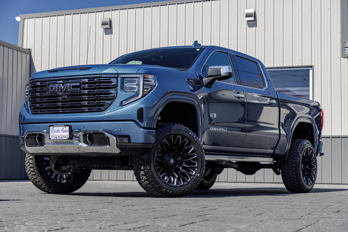 2024 GMC Sierra 1500 Denali Ultimate with a 6" Rough Country lift kit, 22x12 Fuel Strike wheels, and 35" Fury Country Hunter R/T tires.