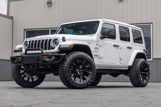 2024 Jeep Wrangler Unlimited Sahara with a 2.5" Rough Country lift kit, 22x12 Fuel Flame wheels, and 35" Fury Country Hunter R/T tires.