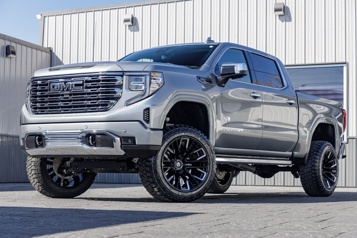 2024 GMC Sierra 1500 Denali Ultimate with a 6" Rough Country lift kit, 22x12 Fuel Rebar wheels, and 35" Fury Country Hunter R/T tires.