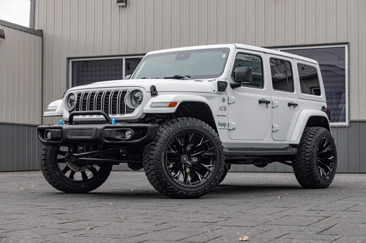 2024 Jeep Wrangler Sahara 4XE with a 2.5" Rough Country lift kit, 22x12 Fuel Flame wheels, and 35" Fury Country Hunter R/T tires.