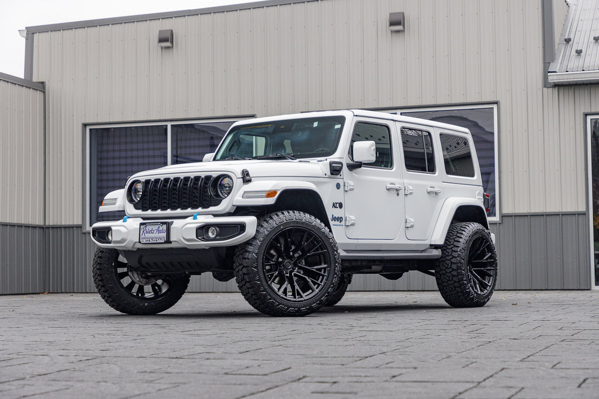 2024 Jeep Wrangler High Altitude 4XE with a 2.5" Rough Country lift kit, 22x12 Fuel Rebar wheels, and 35" Fury Country Hunter R/T tires.