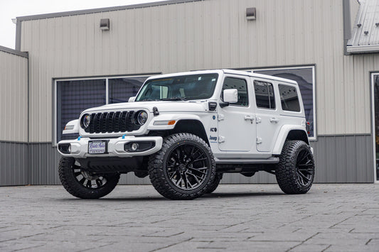 2024 Jeep Wrangler High Altitude 4XE with a 2.5" Rough Country lift kit, 22x12 Fuel Rebar wheels, and 35" Fury Country Hunter R/T tires.