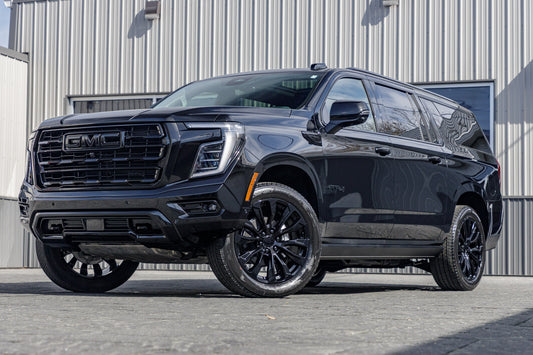 2025 GMC Yukon XL AT4 with GMC Factory suspension, 22x9 GMC Stock wheels, and Bridgestone Alenza tires.