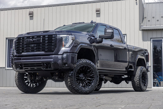 2024 GMC Sierra 2500 Denali with a 5" BDS lift kit, 22x12 Fuel Strike wheels, and 37" Nitto Ridge Grappler tires.