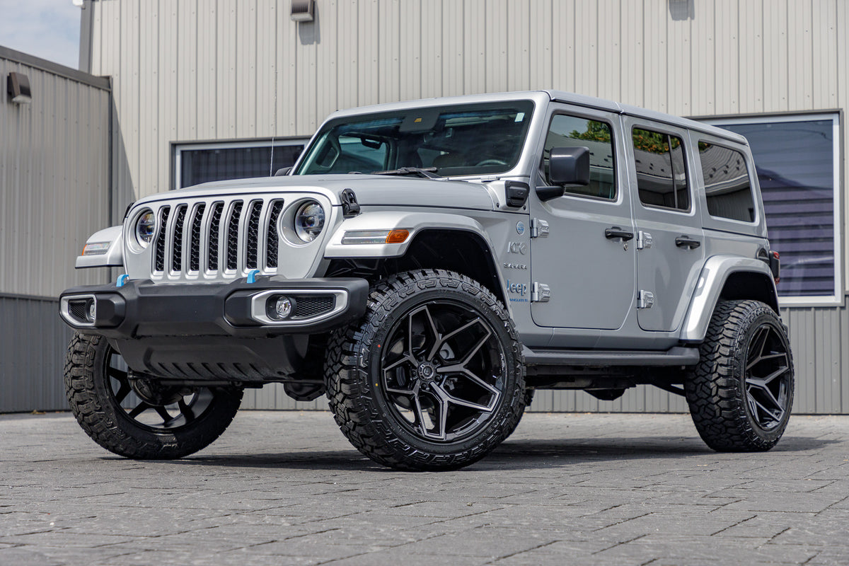 2023 Jeep Wrangler Unlimited Sahara 4XE with a 2.5" Rough Country lift kit, 22x12 Fuel Flux wheels, and 35" Fury Country Hunter R/T tires.
