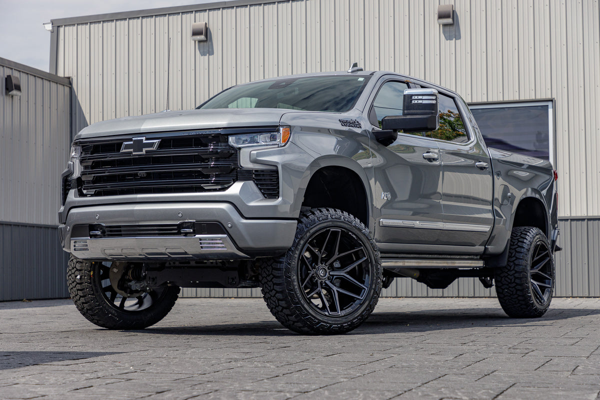 2024 Chevrolet Silverado 1500 High Country with a 6" Rough Country suspension kit, 22x12 Fuel Flux wheels, and 35" Fury Country Hunter R/T tires.
