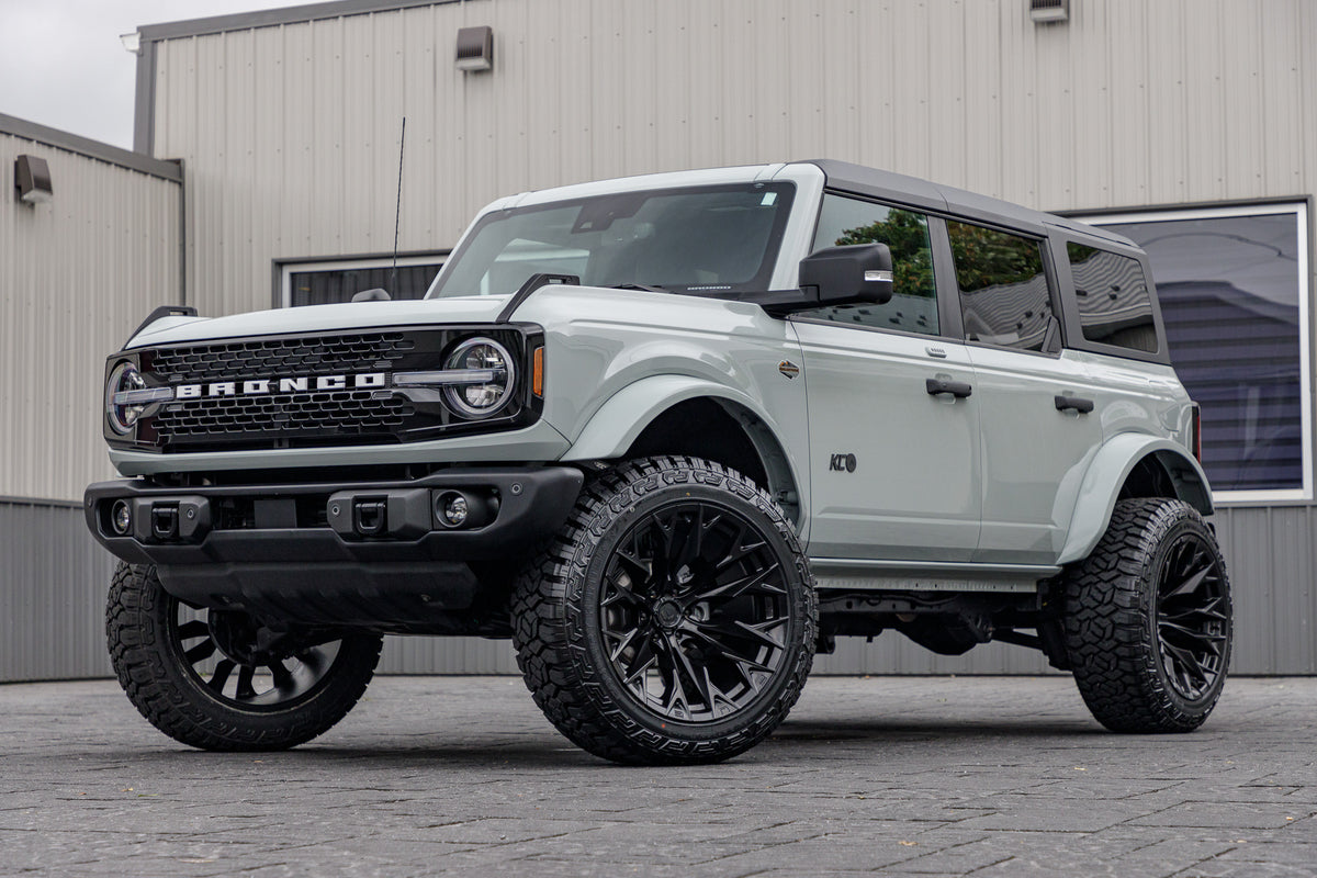 2023 Ford Bronco Wildtrak with a 2.25" Zone lift kit, 22x12 Fuel Flux wheels, and 35" Fury Country Hunter R/T tires.