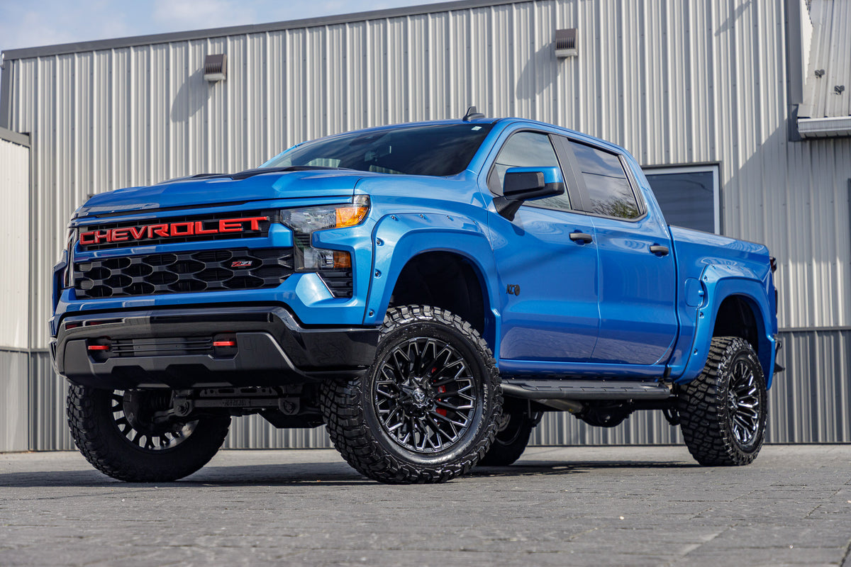 2023 Chevrolet Silverado 1500 Custom Trail Boss with a 4" Zone lift kit, 22x10 Fuel Strike wheels, and 35" BFGoodrich Mud Terrain KM3 tires.
