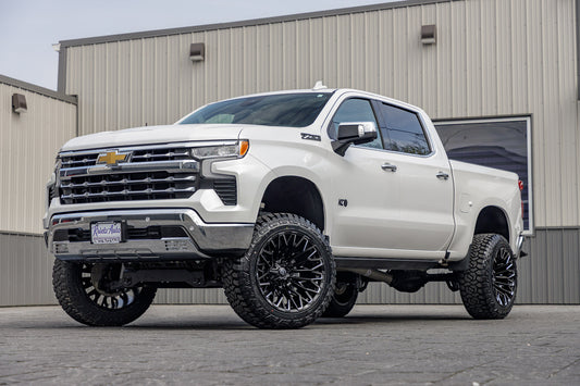 2024 Chevrolet Silverado 1500 LTZ with a 6" Rough Country lift kit, 22x12 Fuel Strike wheels, and 35" Fury Country Hunter R/T tires.