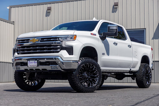 2024 Chevrolet Silverado 1500 LTZ with a 6" Rough Country lift kit, 22x12 Fuel Strike wheels, and 35" Fury Country Hunter R/T tires.