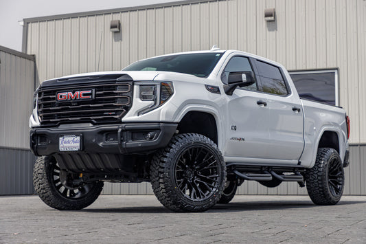 2023 GMC Sierra 1500 AT4X with a 4" ReadyLift lift kit, 22x12 Fuel Rebar wheels, and 35" Fury Country Hunter R/T tires.