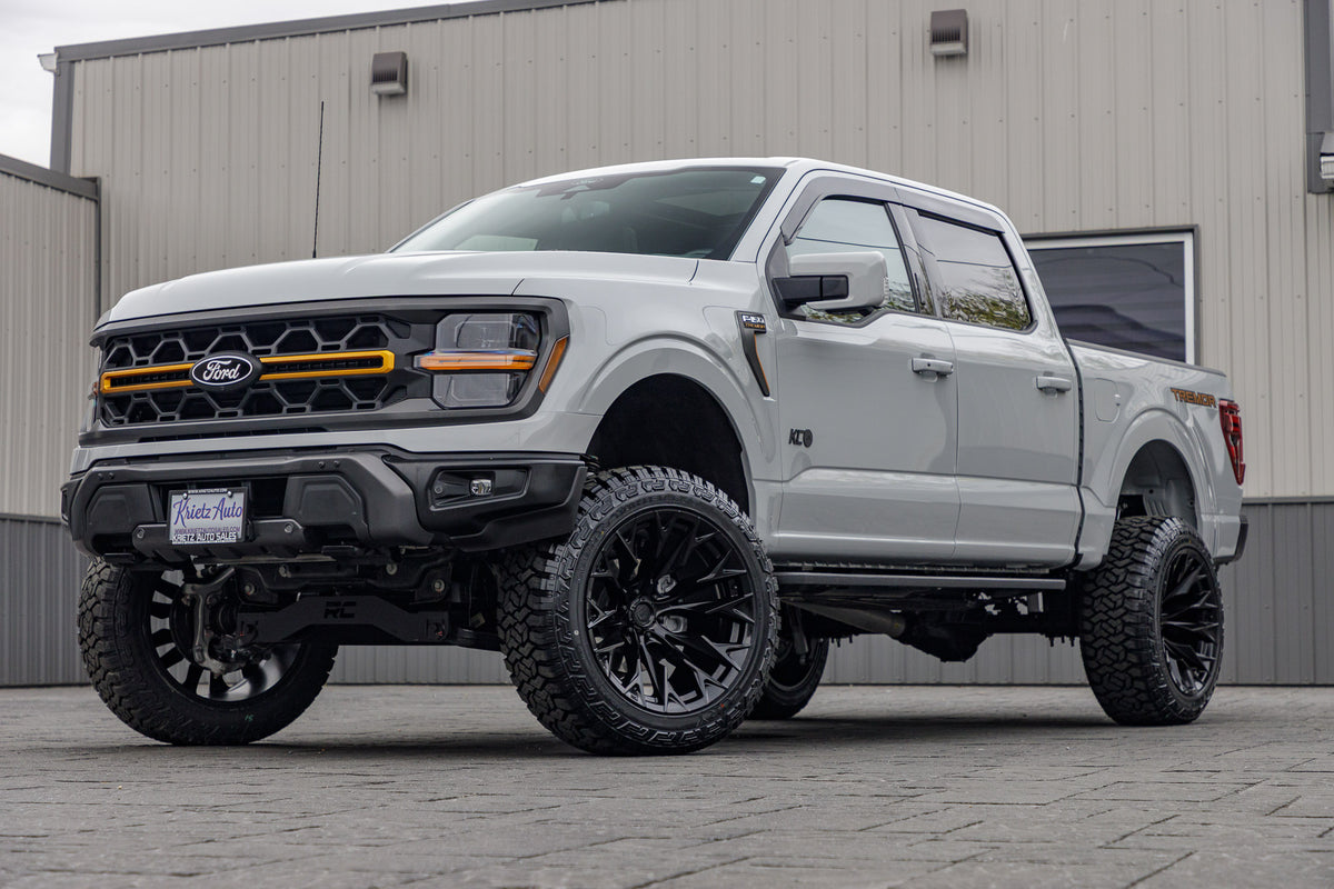 2024 Ford F-150 Tremor with a 6" Rough Country lift kit, 22x12 Fuel Flame wheels, and 35" Fury Country Hunter R/T tires.