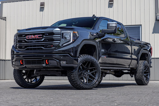2024 GMC Sierra 1500 AT4 with a 6" Rough Country lift kit, 22x12 Fuel Flux wheels, and 35" Fury Country Hunter R/T tires.