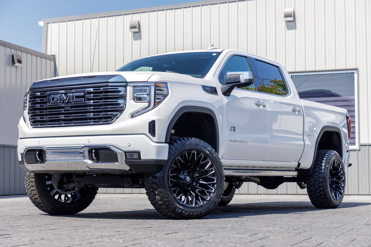 2024 GMC Sierra 1500 Denali Ultimate with a 6" Rough Country suspension kit, 22x12 Fuel Strike wheels, and 35" Fury Country Hunter R/T tires.