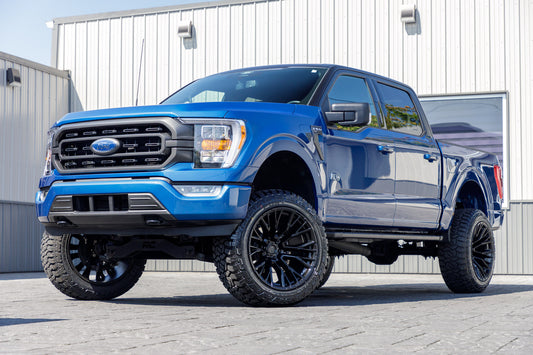 2022 Ford F-150 XL with a 6" Rough Country lift kit, 22x12 Fuel Rebar wheels, and 35" Fury Country Hunter R/T tires.