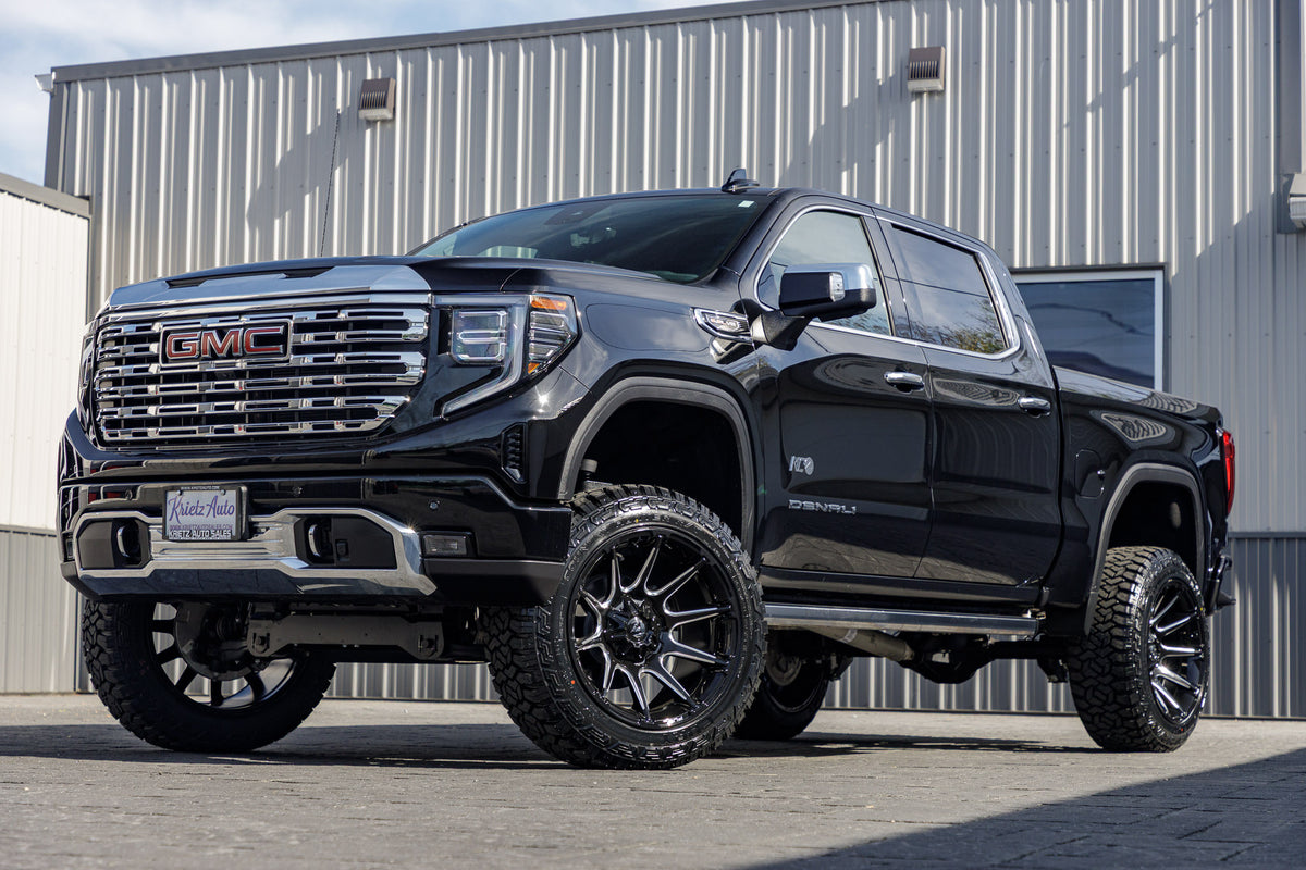 2025 GMC Sierra 1500 Denali with a 6" Rough Country lift kit, 22x12 Fuel Super C wheels, and 35" Fury Country Hunter R/T tires.