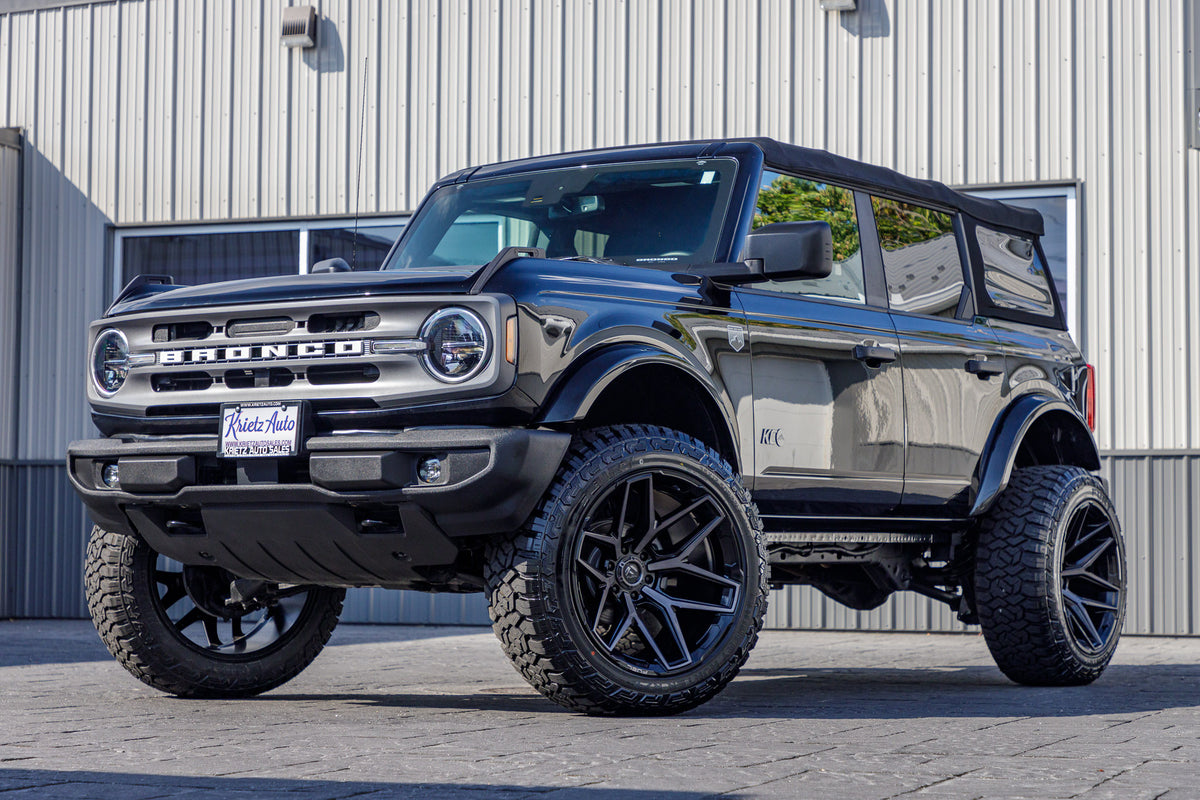 2022 Ford Bronco Bronco Big Bend with a 3.5" Rough Country lift kit, 22x12 Fuel Strike wheels, and 35" Fury Country Hunter R/T tires.